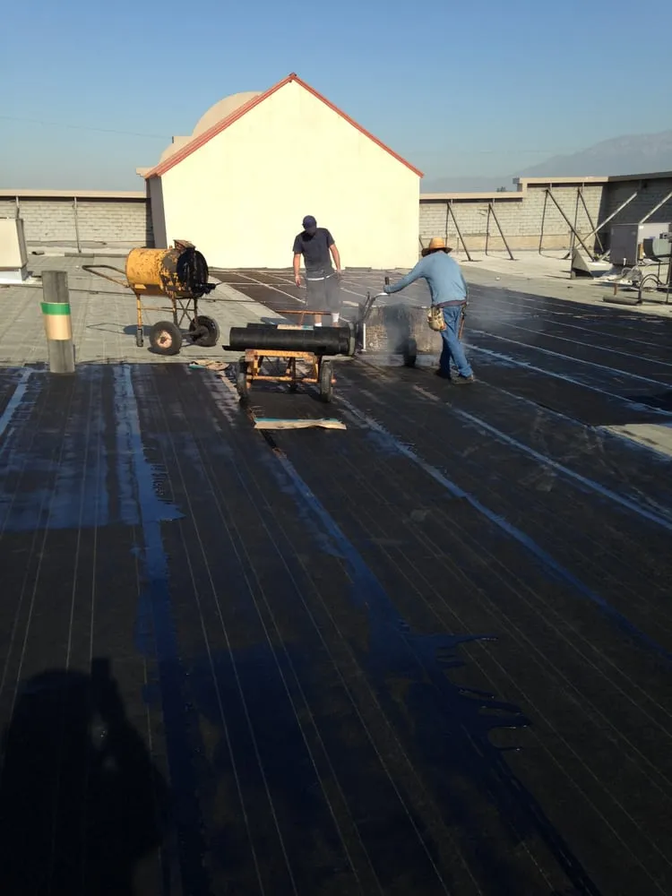 Slide of Hector's Roofing