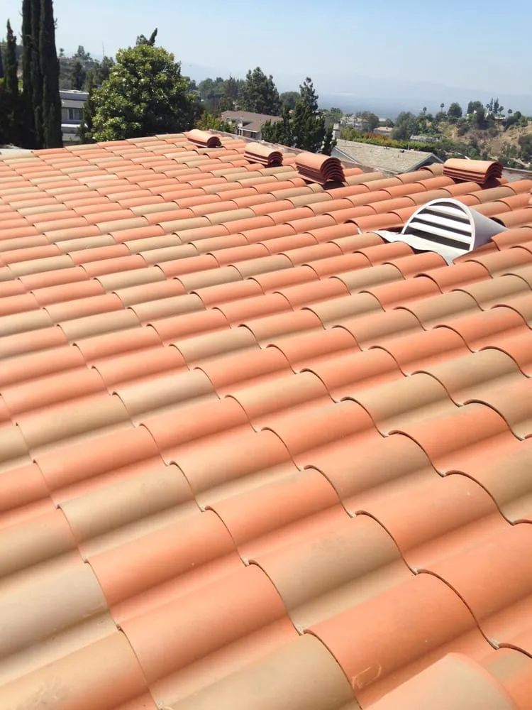 Slide of Hector's Roofing