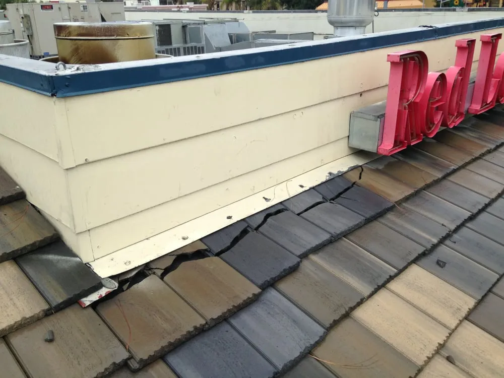 Slide of Hector's Roofing