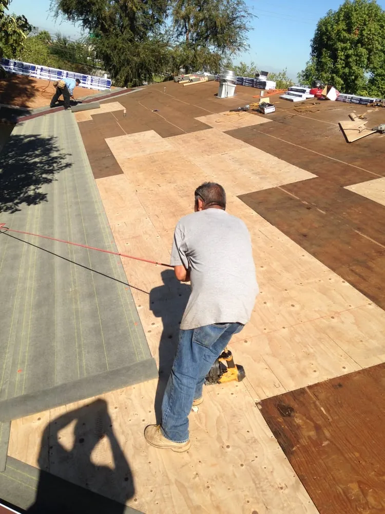 Slide of Hector's Roofing