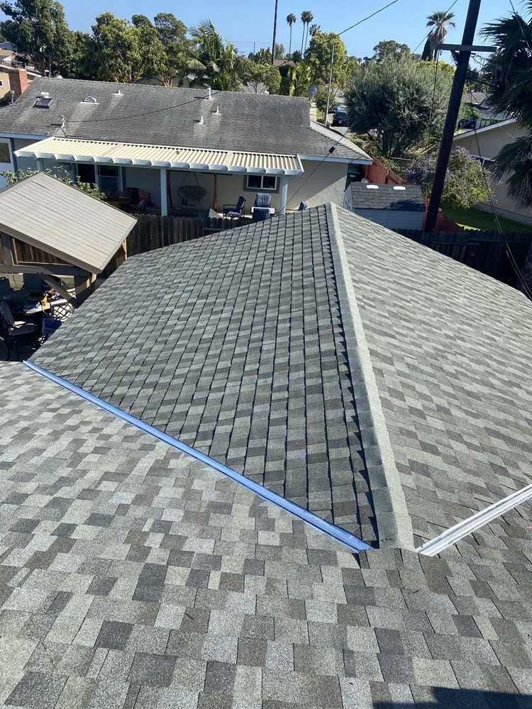 Slide of Hector's Roofing Quality Work