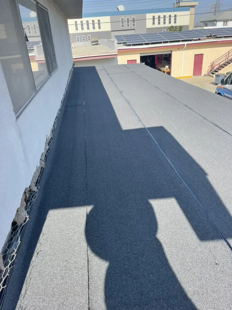 Slide of Hector's Roofing Quality Work