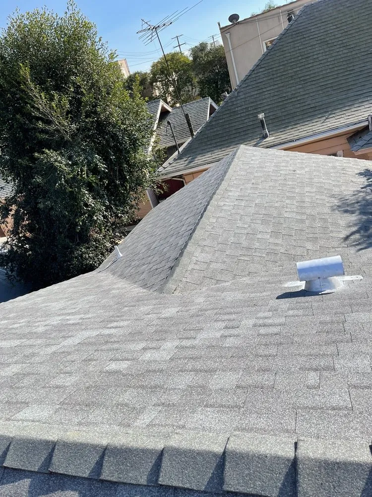Slide of Hector's Roofing Quality Work