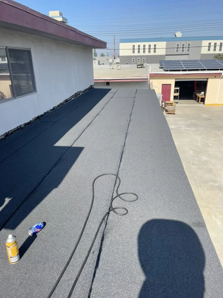 Slide of Hector's Roofing Quality Work