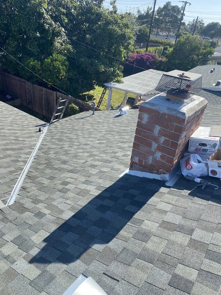 Slide of Hector's Roofing Quality Work