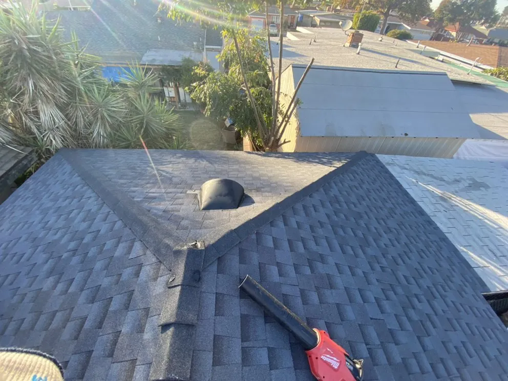 Slide of Hector's Roofing Quality Work