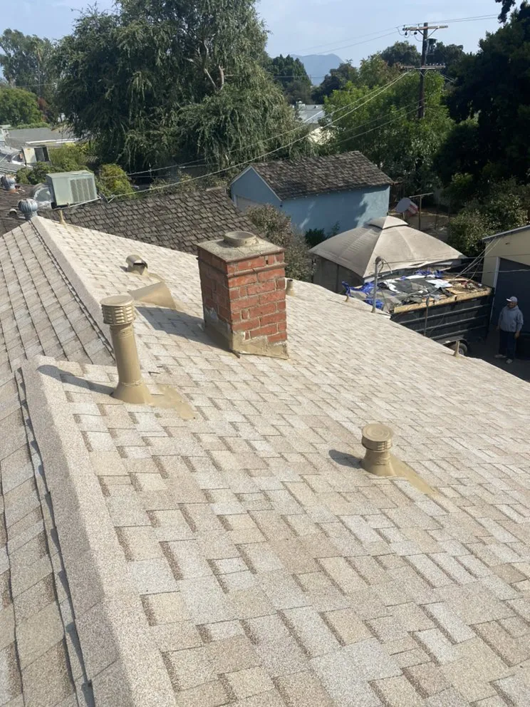 Slide of Hector's Roofing Quality Work