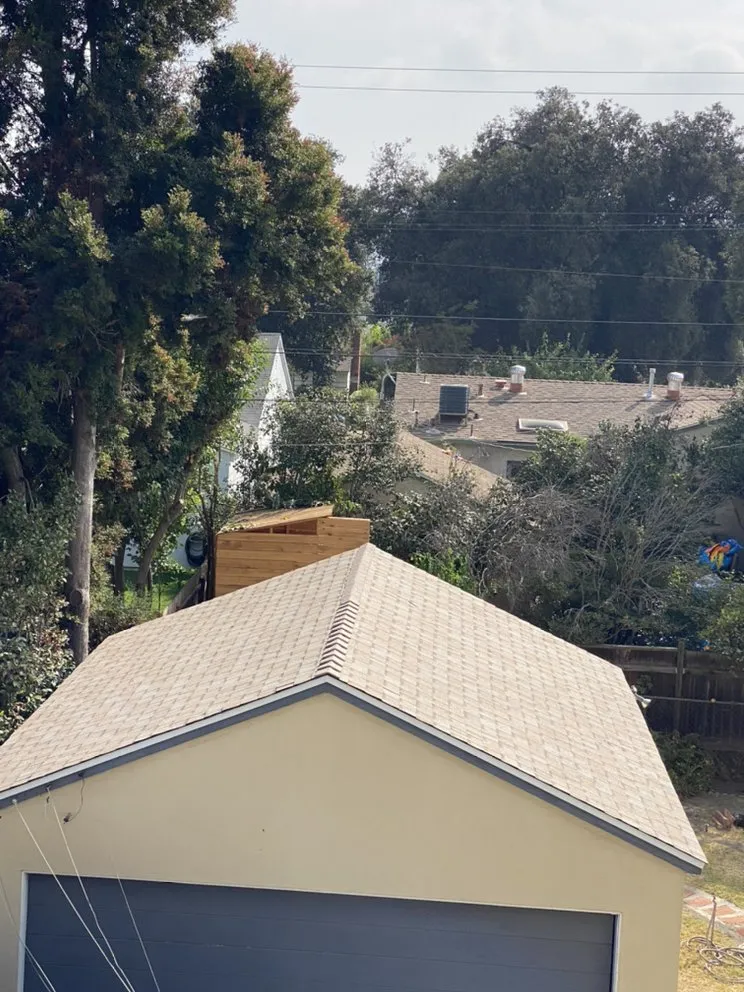 Slide of Hector's Roofing Quality Work