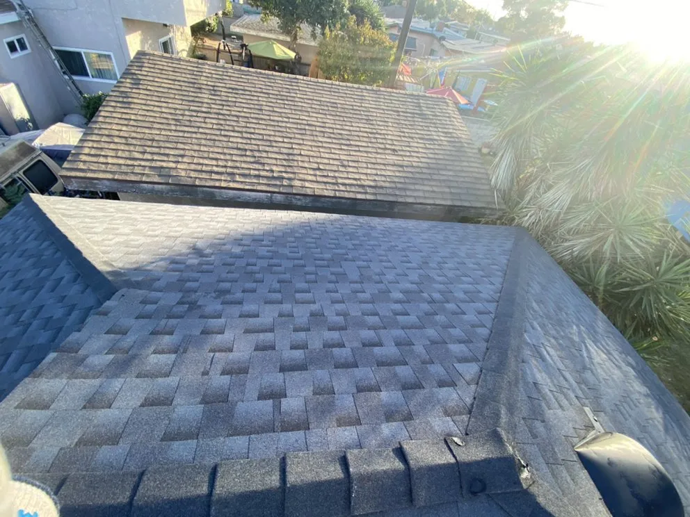 Slide of Hector's Roofing Quality Work