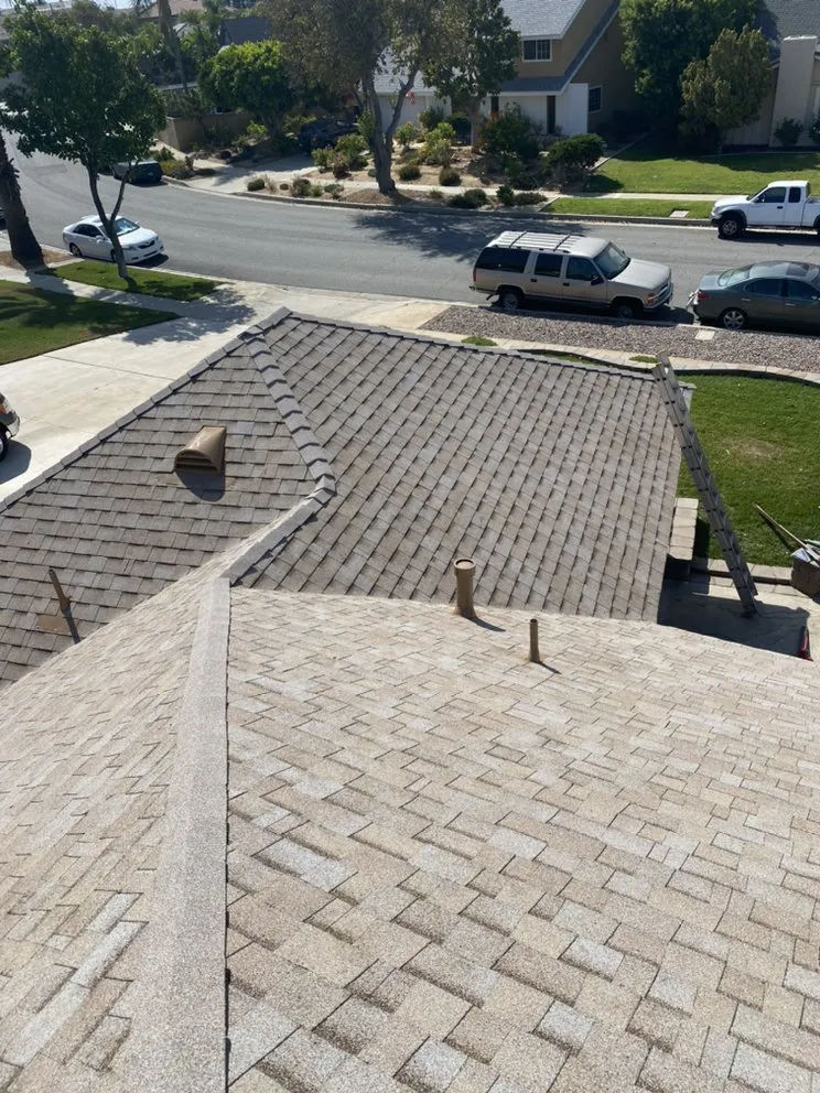 Slide of Hector's Roofing Quality Work