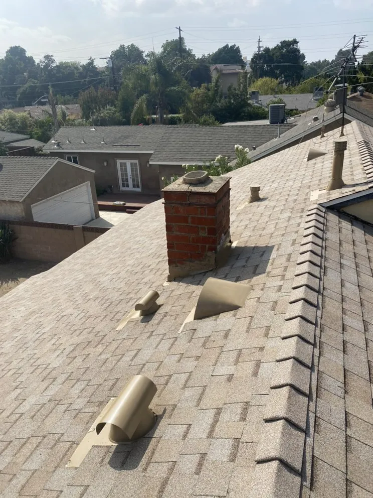 Slide of Hector's Roofing Quality Work