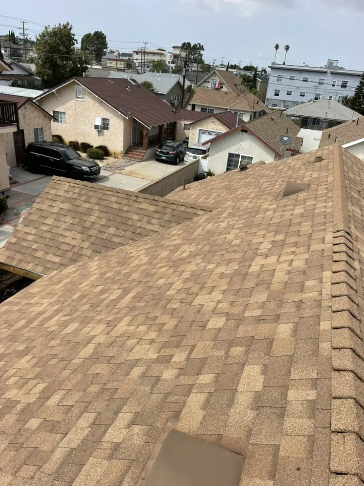 Slide of Hector's Roofing Quality Work