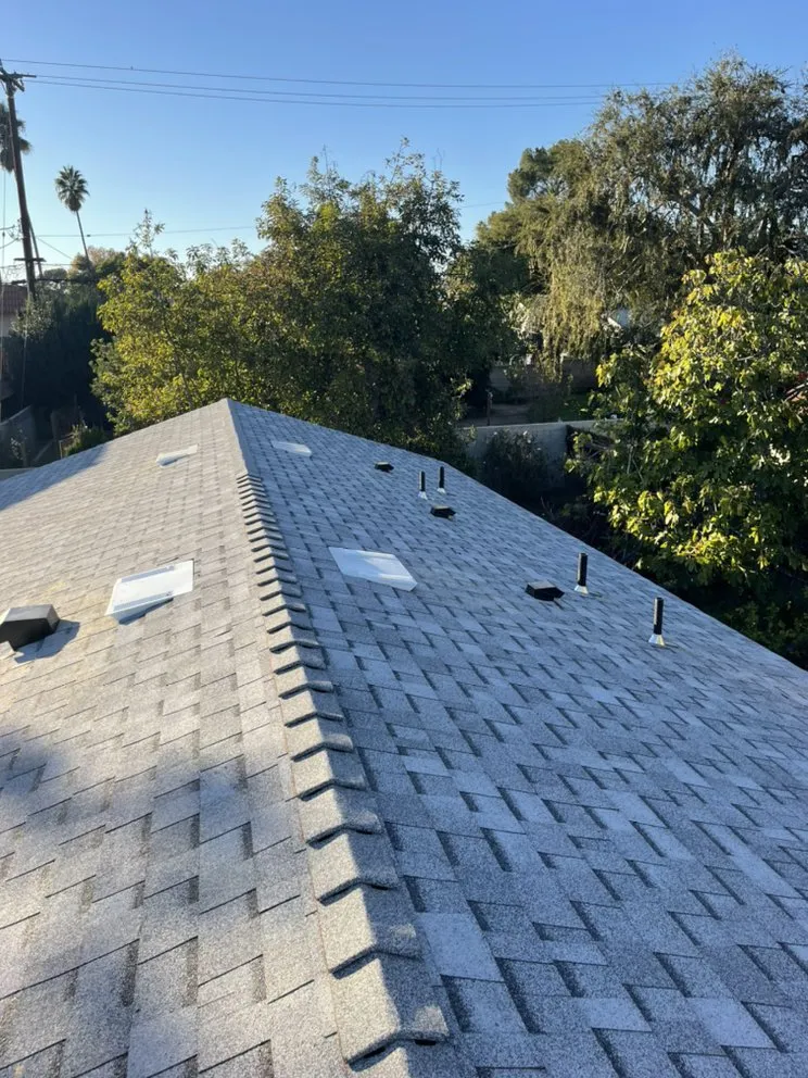 Slide of Hector's Roofing Quality Work
