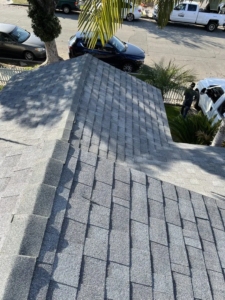 Slide of Hector's Roofing Quality Work