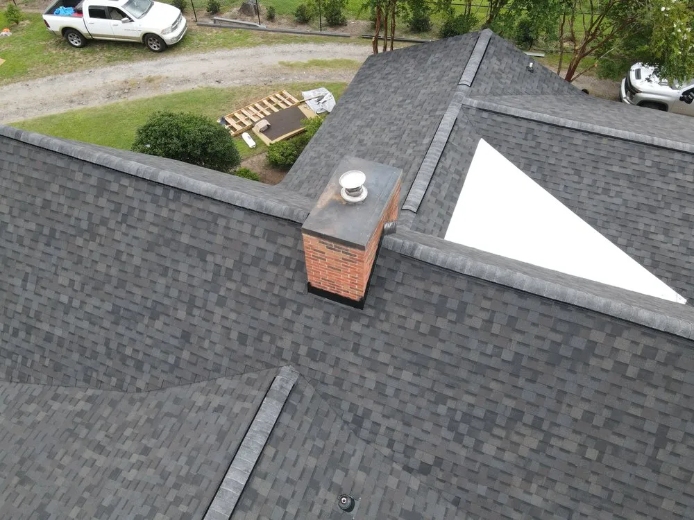 Slide of Helen’s Vinyl Siding and Roofing