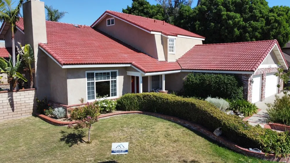 Slide of Henala Roofing