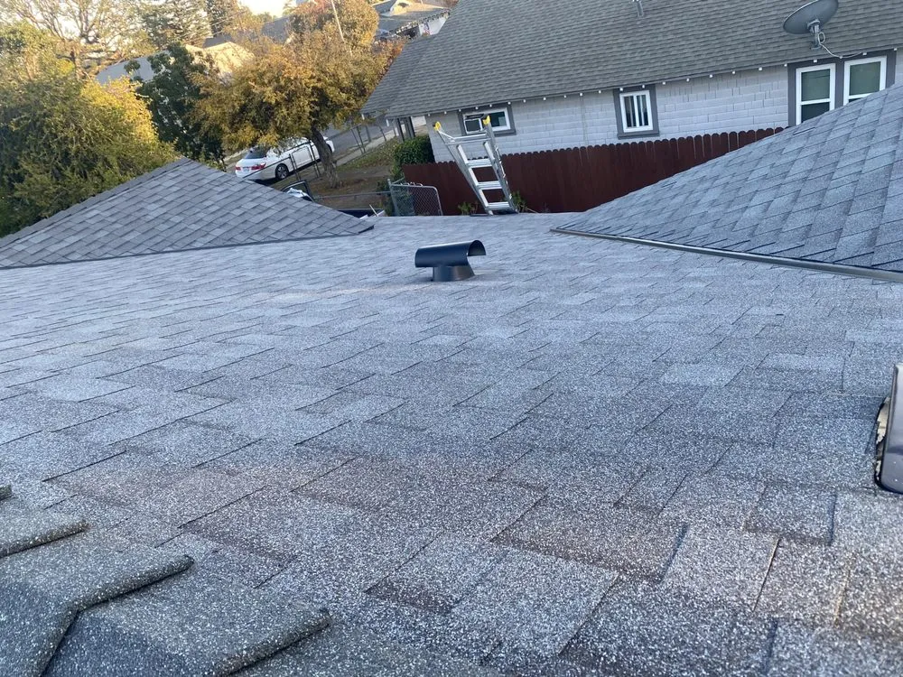 Slide of Henala Roofing