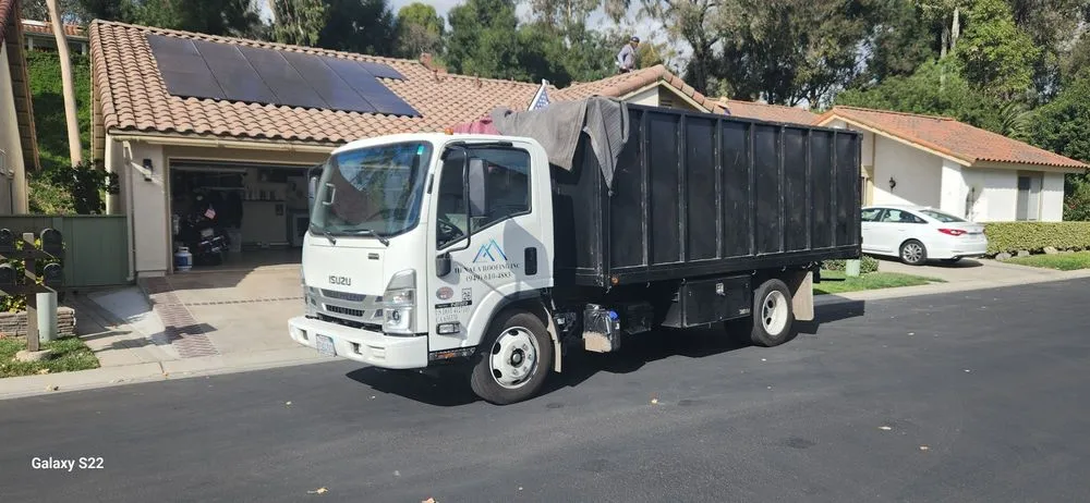 Slide of Henala Roofing