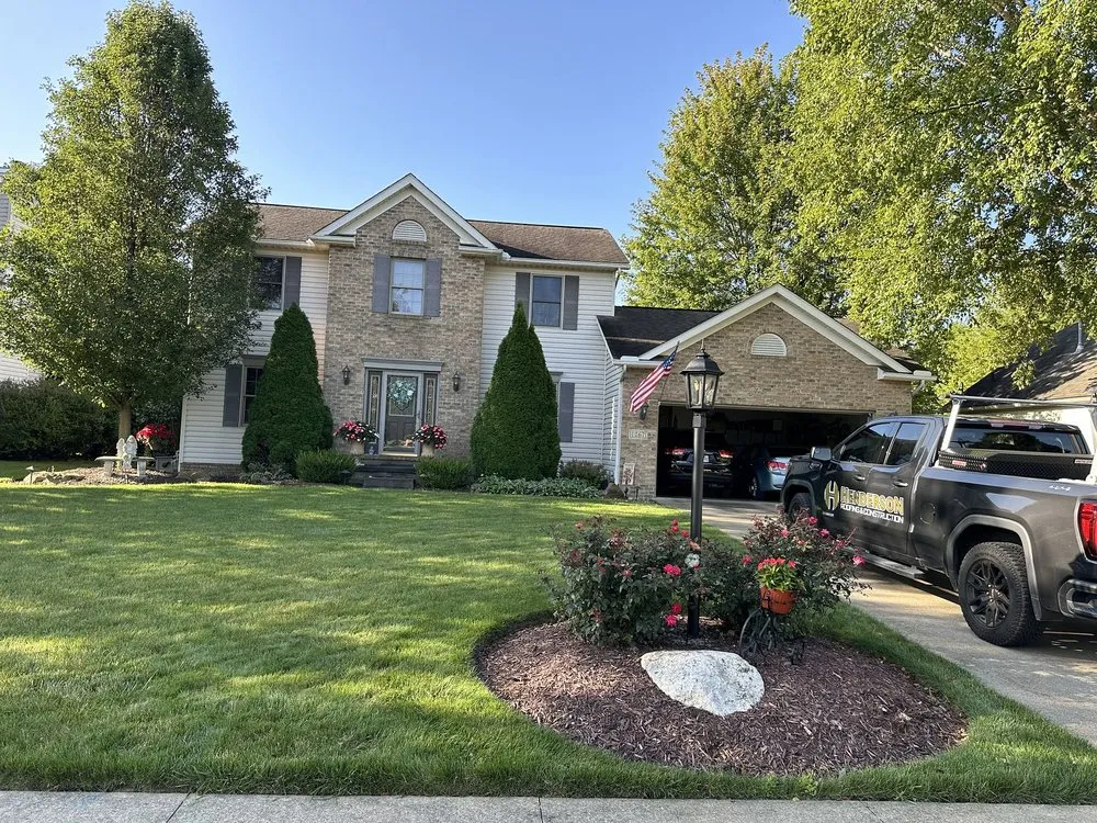 Slide of Henderson Roofing