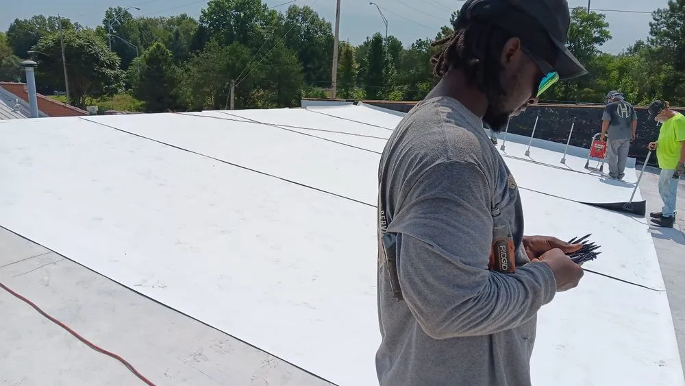 Slide of Henderson Roofing