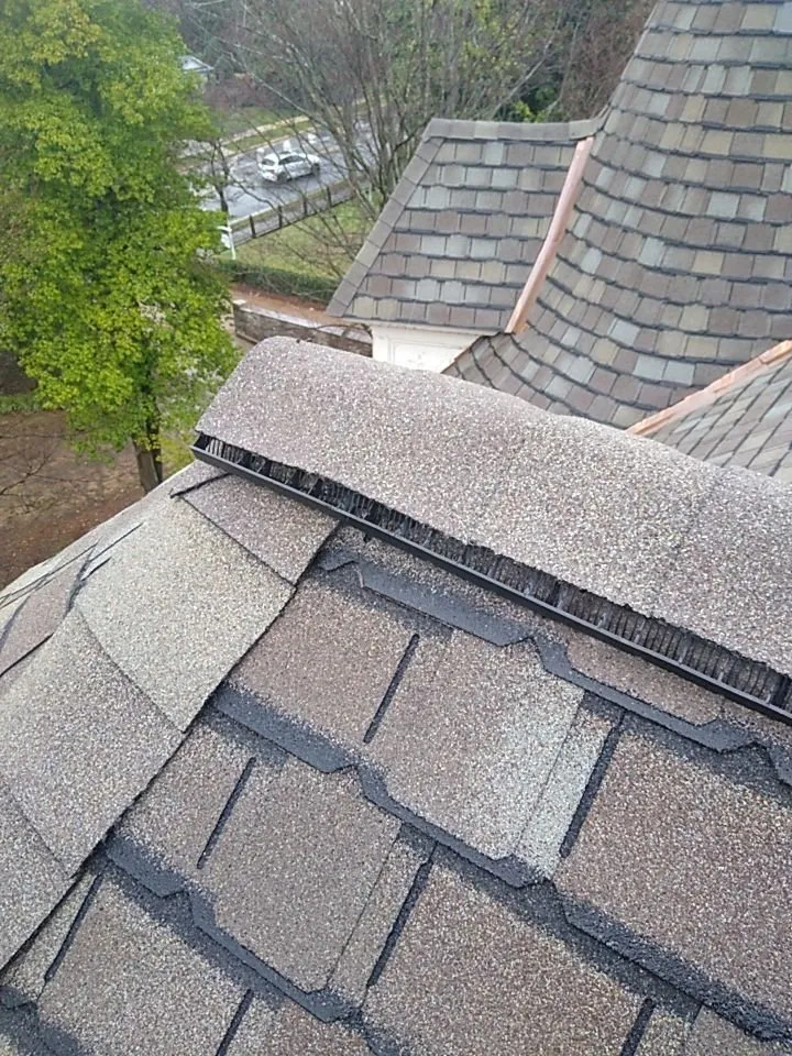 Slide of Henderson Roofing