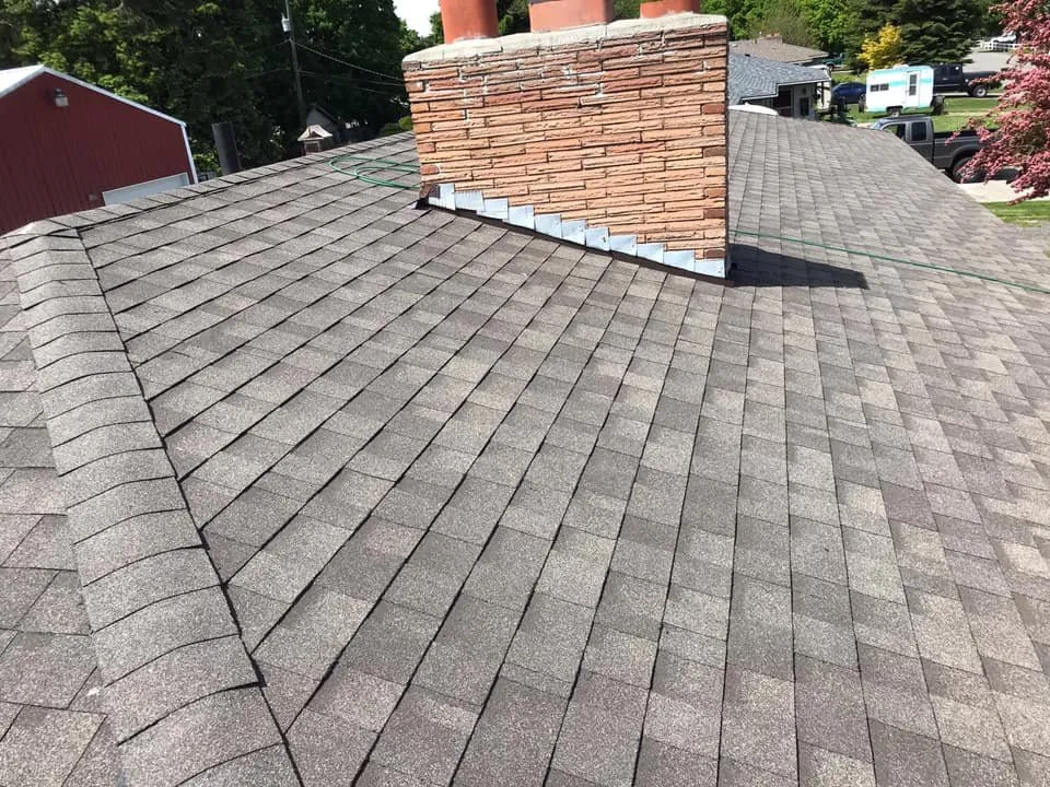 Slide of Henderson Roofing