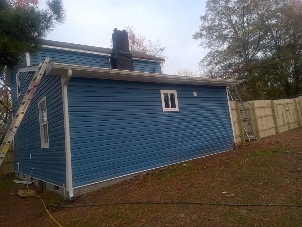 Slide of Henderson's Glass & Roofing