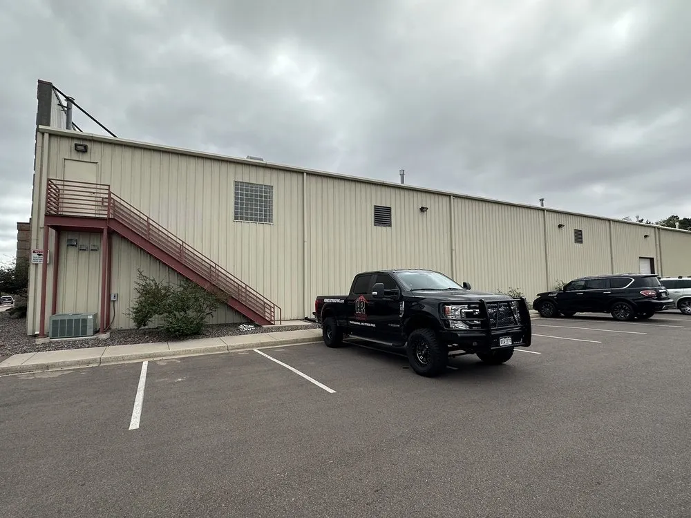 Slide of Hennessey Roofing