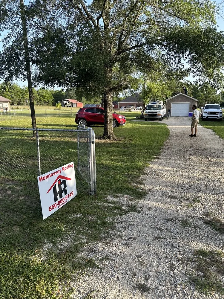 Slide of Hennessey Roofing