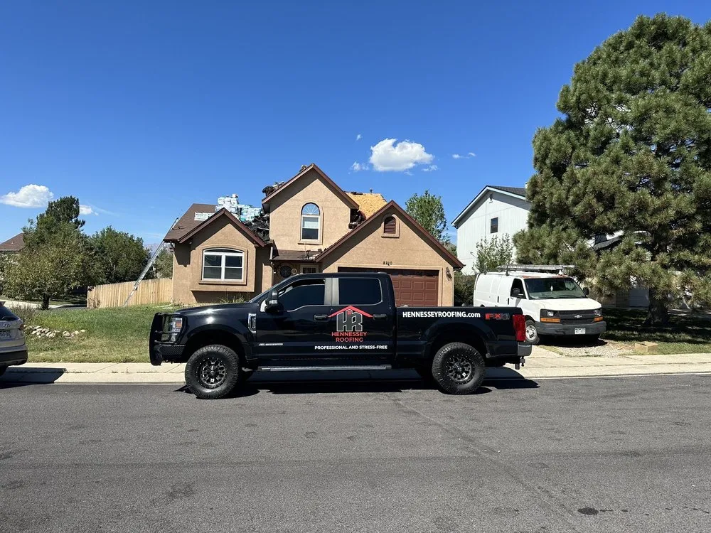 Slide of Hennessey Roofing