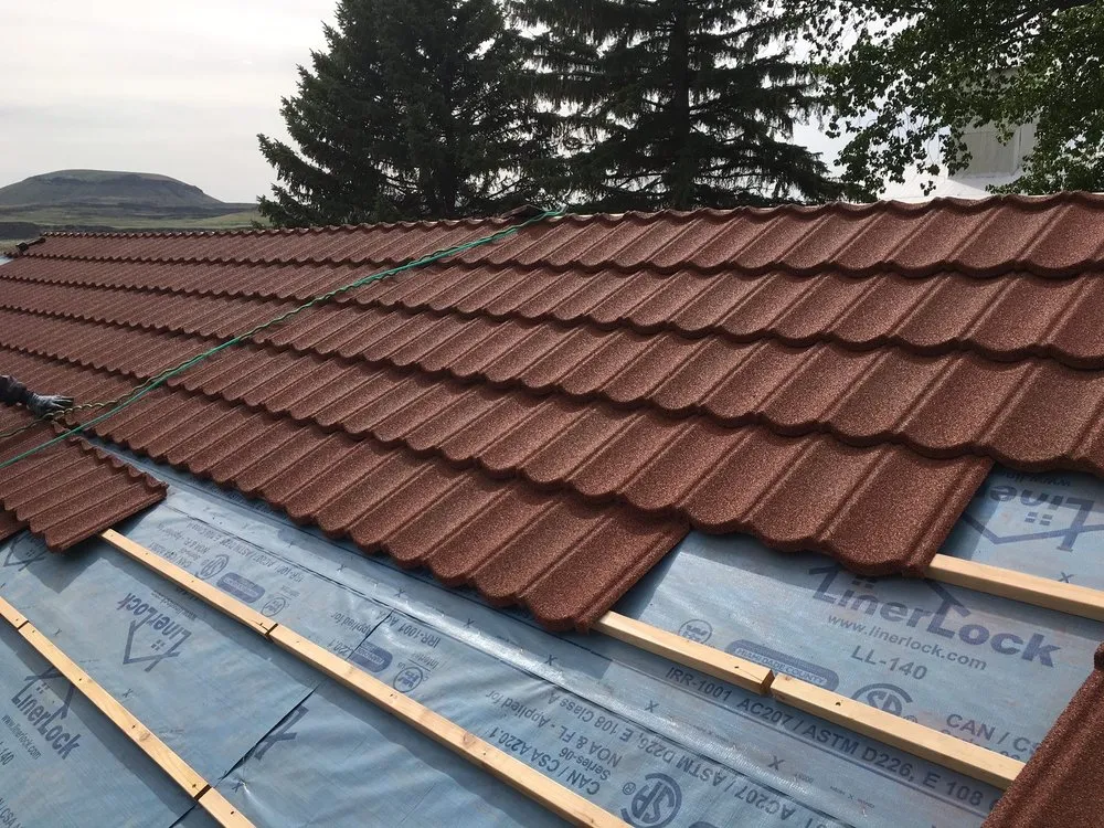 Slide of Henris Roofing & Supply