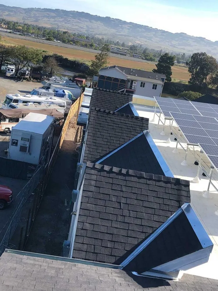 Slide of Henris Roofing