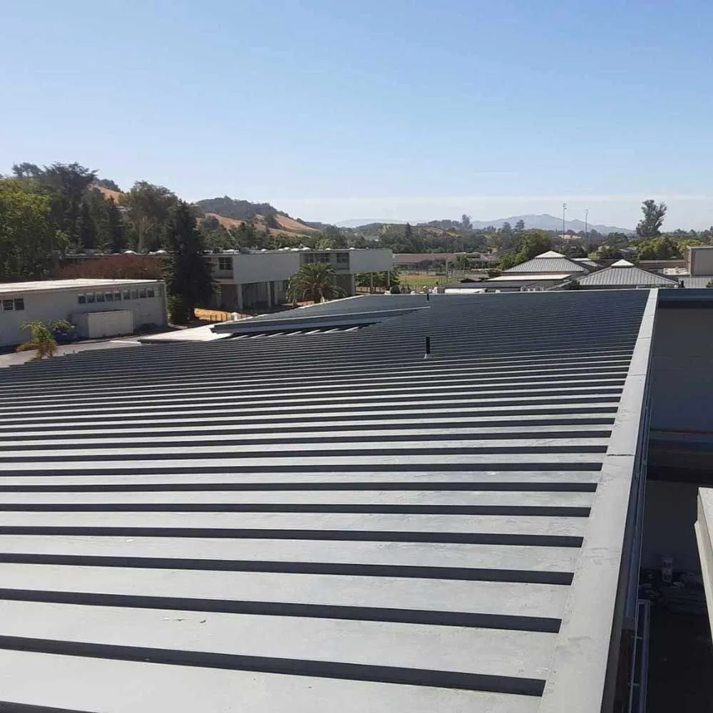 Slide of Henris Roofing