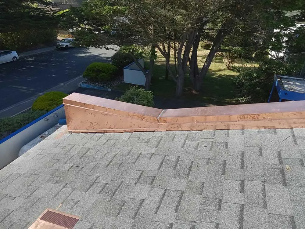 Slide of Henris Roofing