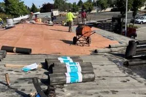 Slide of Henris Roofing