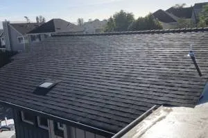 Slide of Henris Roofing