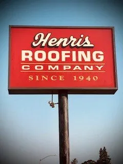 Slide of Henris Roofing