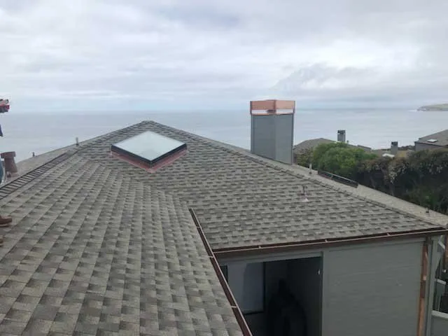 Slide of Henris Roofing