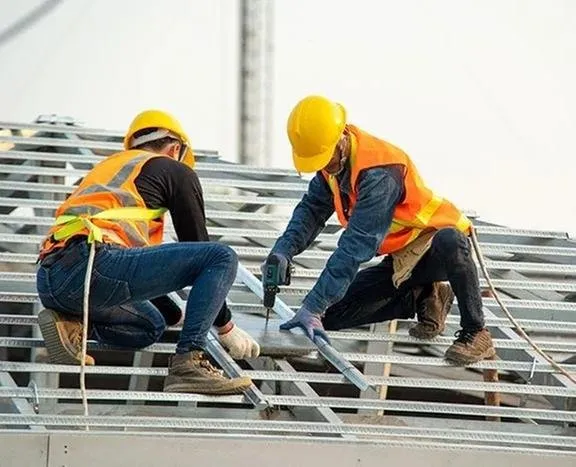 Slide of Henris Roofing
