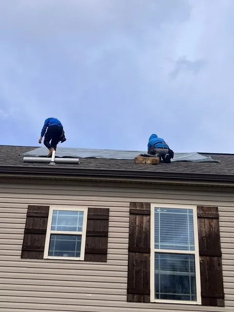 Slide of Henry Brothers Roofing