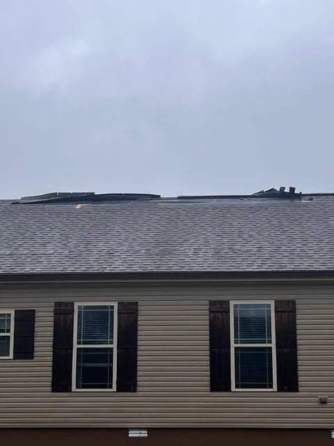 Slide of Henry Brothers Roofing