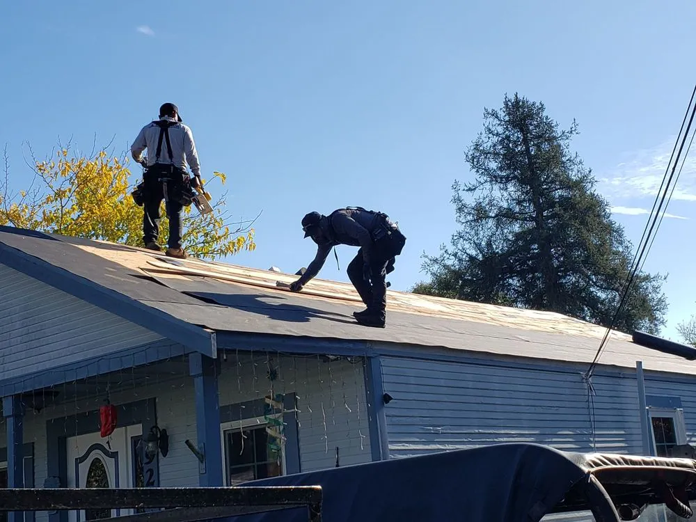 Slide of Henry Roofing