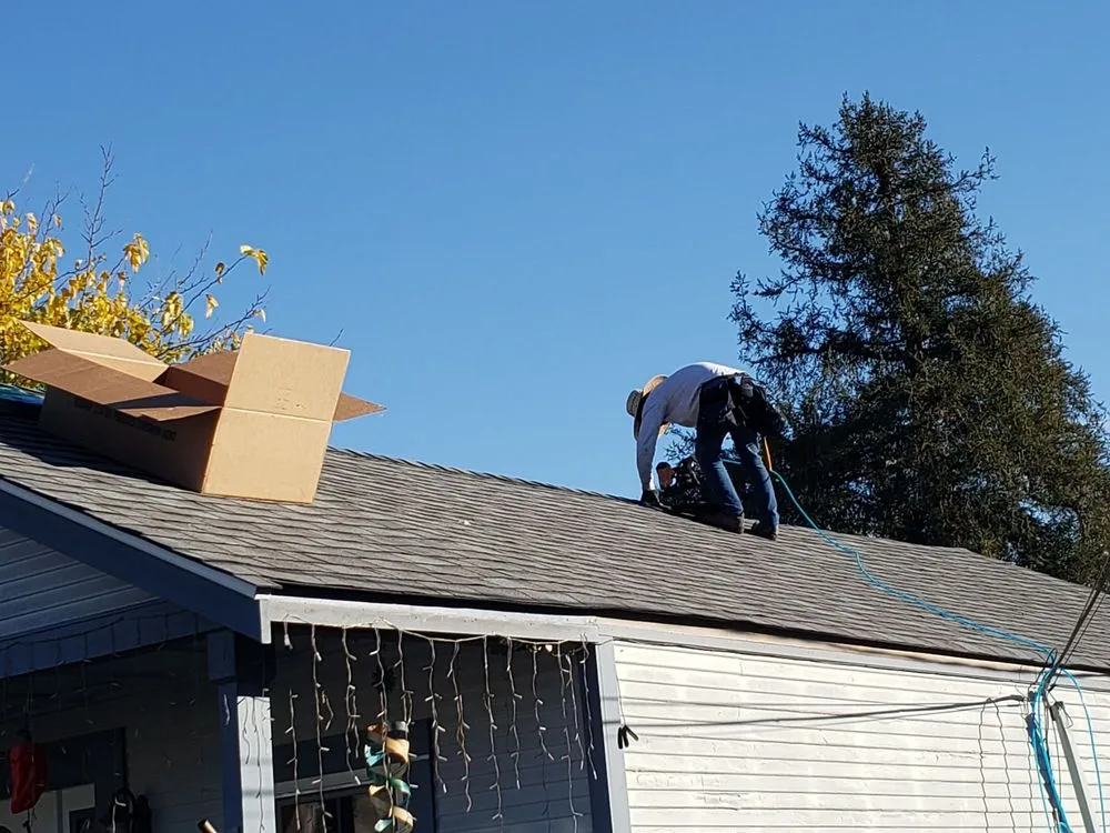 Slide of Henry Roofing