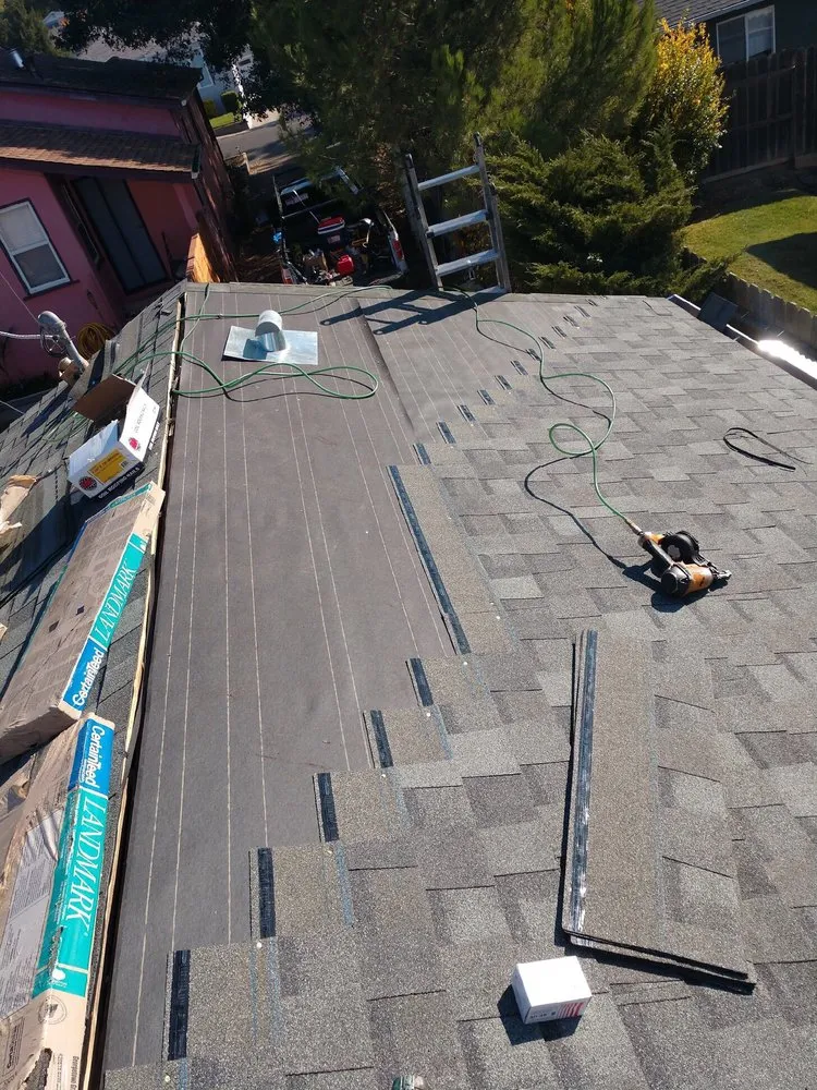 Slide of Henry Roofing