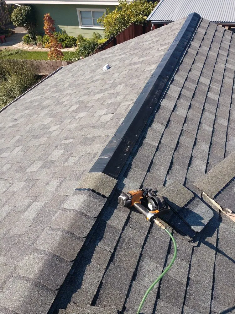 Slide of Henry Roofing