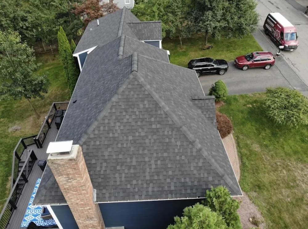 Slide of Henry’s Roofing & Siding