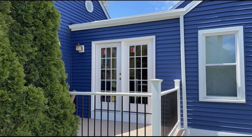 Slide of Henry’s Roofing & Siding