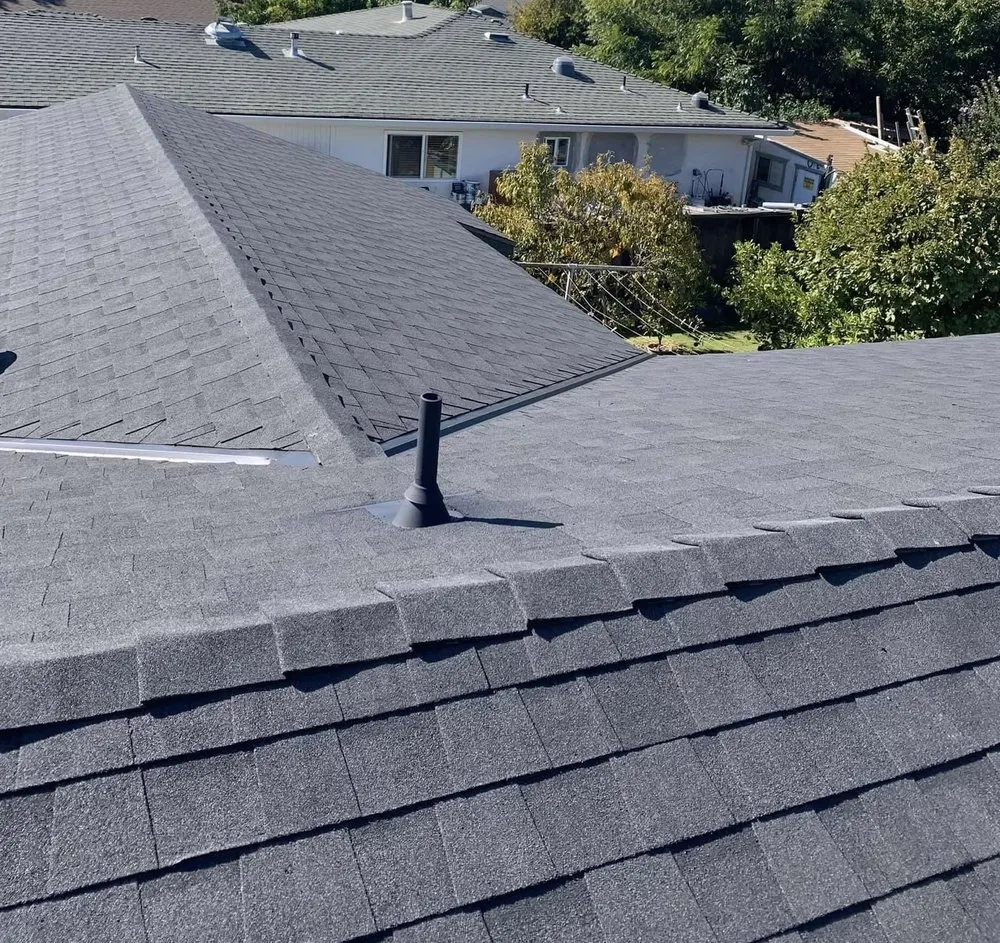 Slide of Her Construction Roofing Specialists 