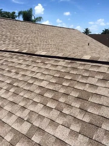 Slide of Her Construction Roofing Specialists 