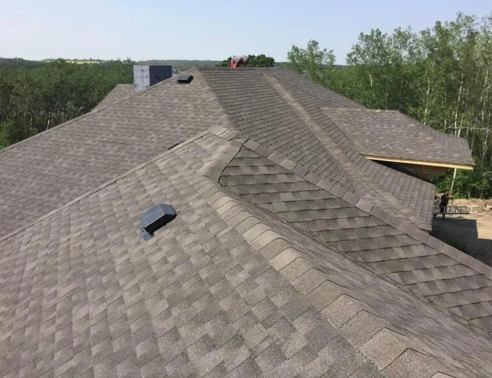 Slide of Her Construction Roofing Specialists 